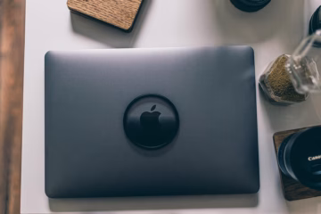 a gray macbook on the table